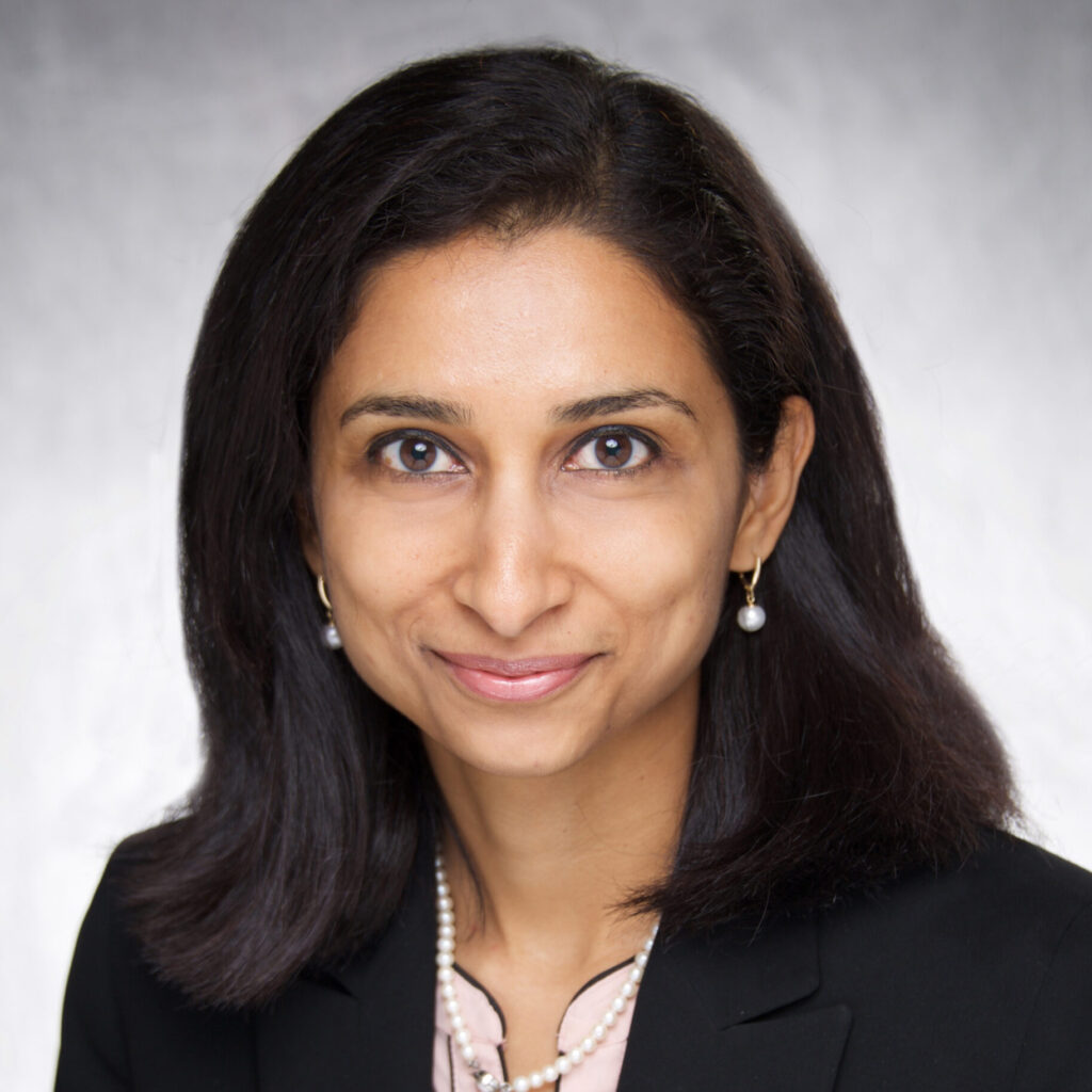 Headshot of Dr Sidhu